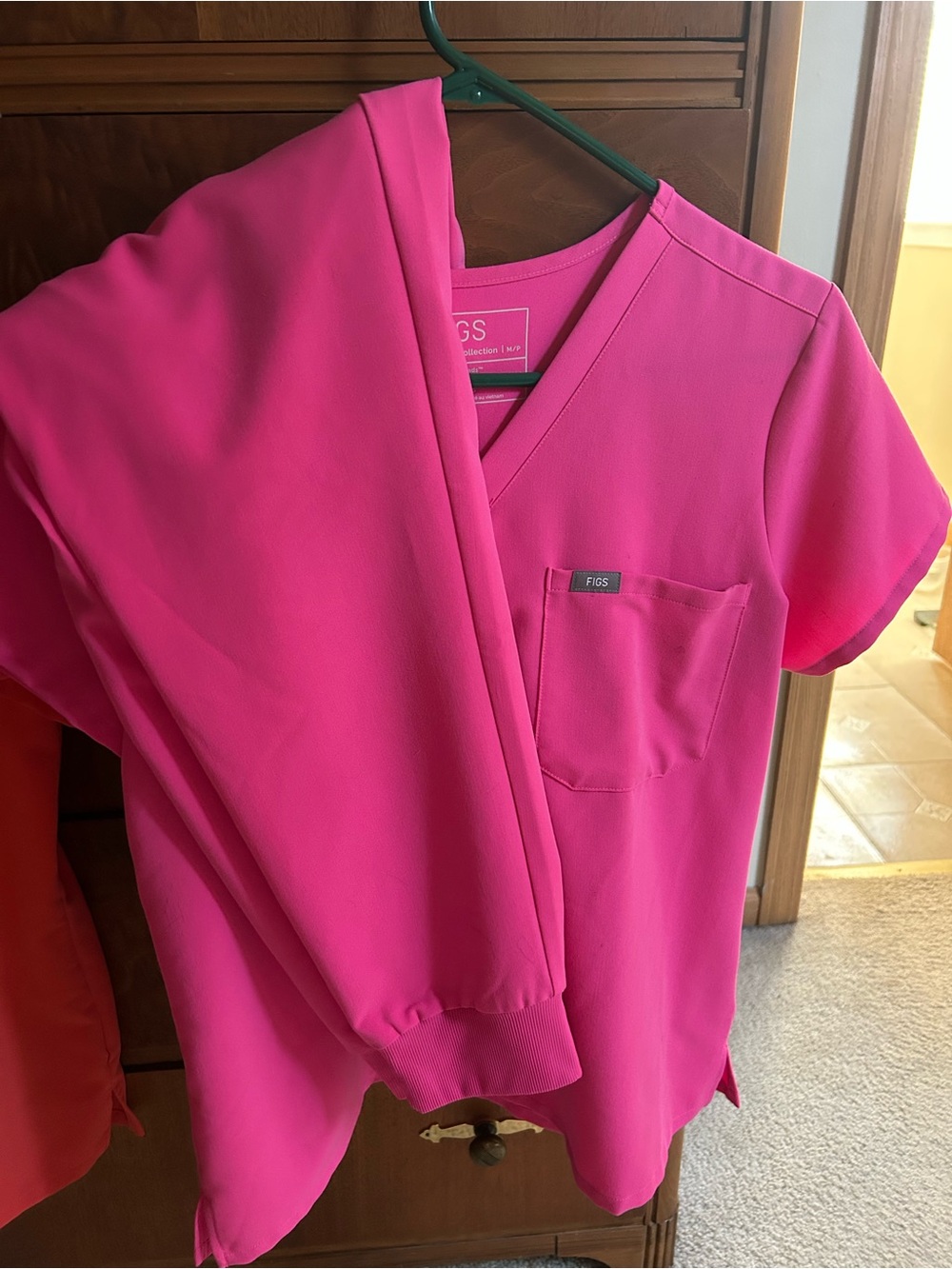 Figs Medium Scrub Top and Petite joggers in “First Responder Pink”